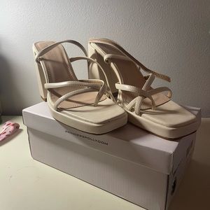 BRAND NEW women’s princess Polly heels, never worn.